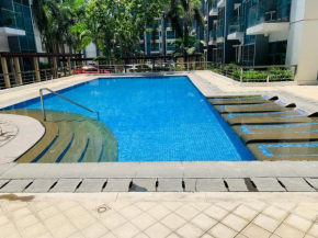 One Palm Tree Villas Condominium - Studio 5M with Balcony - Across Terminal 3 Airport